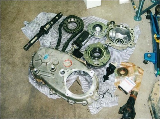 transfer case components scattered on the garage floor