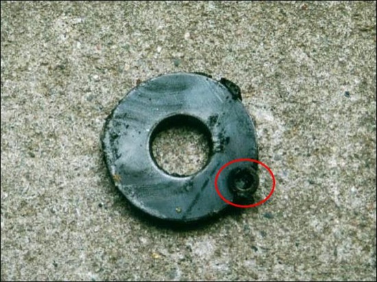 little washer held by the transfer case magnet