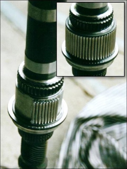 placing the needles from the needle bearing onto the transfer case output shaft