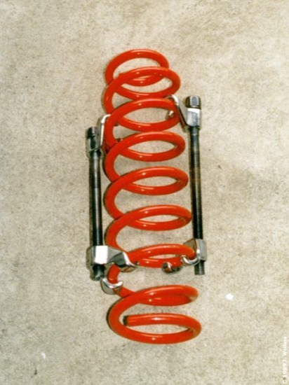 coil spring with spring compressors
